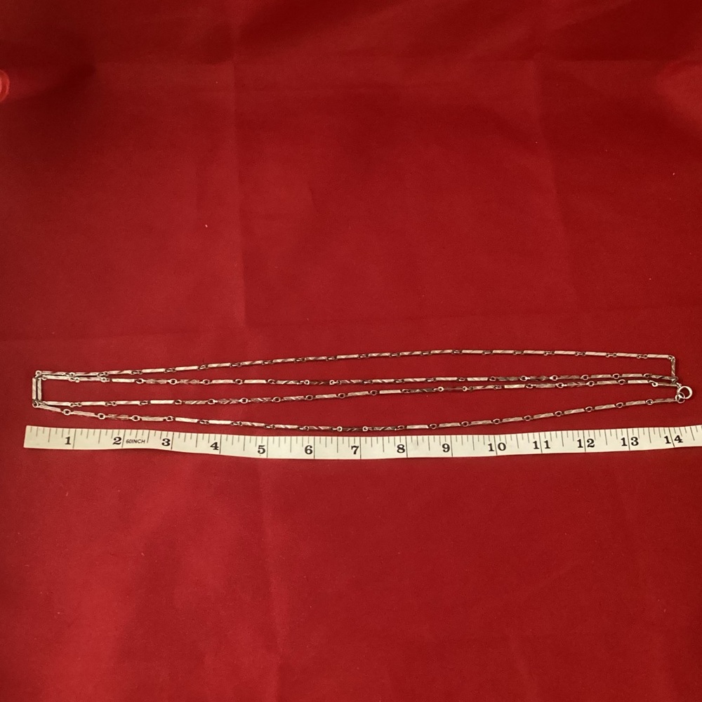 Very long silver tone metallic rectangle pieces necklace